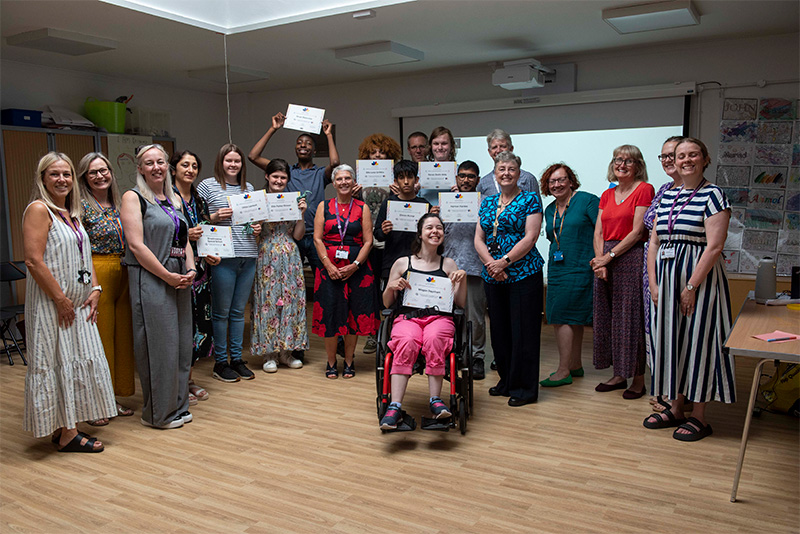 left to right, are Alison Baggs, Participation Officer, Sarah Reynolds, SEND Early Identification, Helen Taylor, Head of SEND and Inclusion, Shama Hussain, Chloe Lambert, Ellie Parker Brewer and Ne-yo Makombe, all HY5! ambassadors, Alison Hinds, Co Chair SEND and Inclusion Partnership Board, Ellis Lees Griffiths and Dhiren Kumar, both HY5! ambassadors, Andrew Scragg, Participation Officer, Megan Baynham, Kieran Smith-Mills and Harman Kambo, all HY5! ambassadors, Paul Tulley, Co Chair SEND and Inclusion Partnership Board, Councillor Jacqui Coogan, the City of Wolverhampton Council's Cabinet Member for Children, Young People and Education, Dr Cathy Higgins, Divisional Medical Director/Consultant Paediatrician, Pate Tate, SEND Advisor, Lucy Newman, SEND Advanced Practitioner, and Hannah Bradley, Co-production and Youth Engagement Team Manager